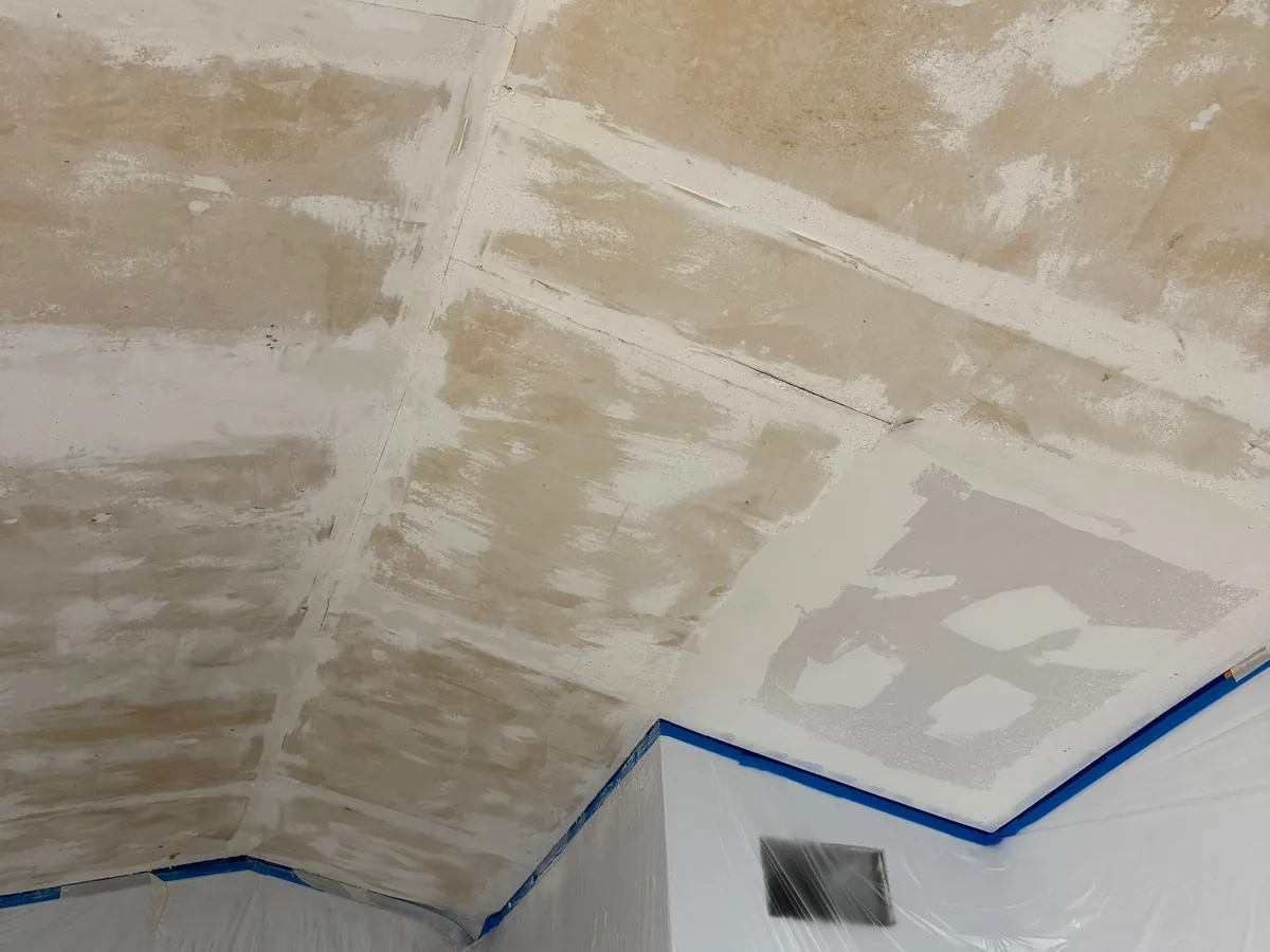 Ceiling patched and textured back to a smooth surface